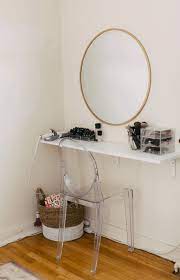 The simple floating shelf is holding all the. 20 Diy Stylish Chic Makeup Vanities In 2021