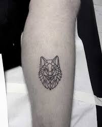 Geometric Wolf Head Tattoo On The Calf Geometric Wolf Geometric Wolf Tattoo Small Wolf Tattoo