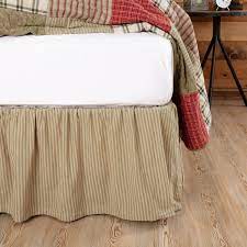 Making a bed skirt from ticking fabric is a way to subtly introduce pattern that doesn't fight with other components of the room. August Grove Church Strett Ticking Stripe 16 Bed Skirt Reviews Wayfair