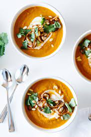 Add vegetable broth, potato, carrots, onion, celery, and ginger; Carrot Ginger Soup Recipe Easy Healthy Downshiftology
