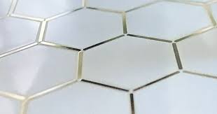 Black And Gold Tiles Uk Gold Trimmed White Hexagon Tile Gold Tiles Bathroom White Hexagon Tiles Hexagon Tiles