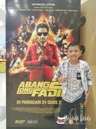 Shuib as an assassin known as tiger. Jom Layan Abang Long Fadil 2