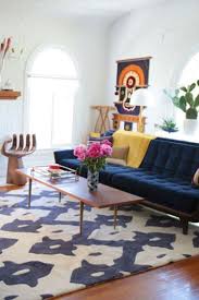 Choosing A Rug That S Too Small Hometips Rugs In Living Room Living Room Area Rugs Trendy Living Rooms