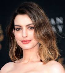 Anne Hathaway is embracing her post-baby body and we love it