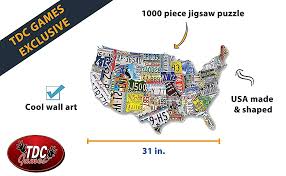 American puzzles vanity 50 state license plate jigsaw puzzle 1000 pieces by lewis johnson. Amazon Com Usa License Plate Map 1000 Piece Jigsaw Puzzle In The Shape Of The Us 31 Inches Long Cool Wall Art Toys Games