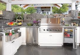 Outfit it with pieces like outdoor kitchen cabinets to store cooking tools and other supplies, and an outdoor kitchen island with a sink for easy cleanup. Outdoor Appliances Equipment Landscaping Network