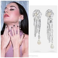 katyperry wearing @jilsander 'Silver Metallic OTK Boots' ($1,650) while  performing at the #iHeartJingleBall last night in New York! ✨ #katyperry  #fashion #katyperryfashion #celebritystyle #katyperrystyle #143 #jilsander