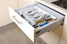 I enlisted a fancy bourbon box (booker's, an amazing whiskey, by the way) to store items that cut (think: Open Organized Kitchen Drawer With Utensils Stock Photo Picture And Royalty Free Image Image 17461493