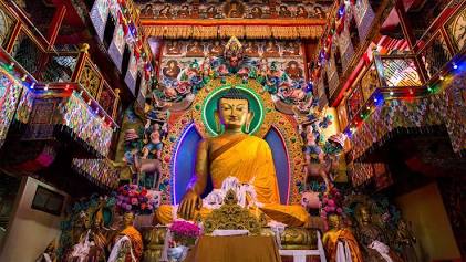 The towering golden Buddha inside the main prayer hall, AI generated