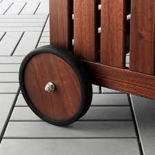Sturdy outdoor benches are available with backrests for added comfort, or backless for easy storage under the table. Applaro Brown Stained Storage Bench Outdoor Width 128 Cm Ikea