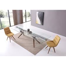 The design of the table lends itself beautifully both to modern or more classic/traditional interiors. China Factory Modern Clear Tempered Glass Dining Table With Wooden Legs China Dining Table Glass Dining Table