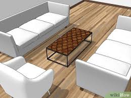 Place a sofa and chair on opposite sides of the room against the long walls. 3 Ways To Decorate A Long Narrow Living Room Wikihow