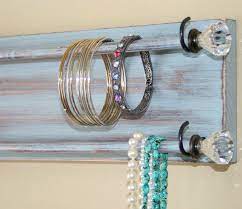 Just enough to keep the nail in place. Jewelry Holder Organizer Bracelet Holder Rack Headband Wall Hanging Necklace Holder Bracelet Organizer Jewelry Holder Organizer Diy Jewelry Holder