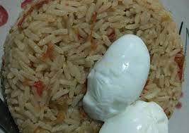 Set the egg upright in an egg cup or a small ramekin filled with rice. How To Make Ultimate Jollof Rice And Boiled Egg Best Recipes