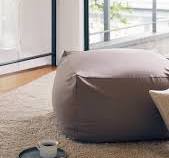 Sink into the MUJI Body Fit Cushion., The MUJI Body Fit Cushion can be used  in a variety of ways to provide maximum comfort., Find them in stores and  online., #MUJI #MUJIUSA
