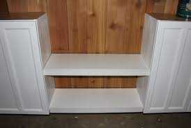 Here's the space between the wall mounted cabinets. Creating Shelves Between Cabinets The Cavender Diary