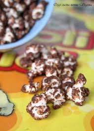 Lasciamo asciugare il cioccolato fuori dal frigo. Pop Corn Al Cioccolato Video Ricetta Tutti A Tavola Con Cinzia
