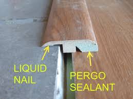 You may have to cut some pieces as you install vinyl flooring, especially if your room has some odd corners or it sounds like laying the floor all in the same direction as the hall would be the best option. Modifying Laminate Transitions To Fit Transition Flooring Installing Vinyl Plank Flooring Transition Strips