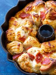 Place into a greased bundt pan. Pizza Monkey Bread Recipe The Girl Who Ate Everything