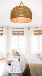 A Classy Neutral Boho Bedroom With Statement Lighting Home Decor Styles Home Decor Minimalist Living Room