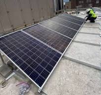 Install Solar Panel Ballast System On A Flat Roof