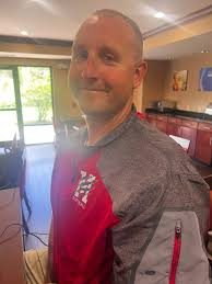 Mossel Bay Pro Club Amanda handing over the sponsored Medilyte to the  winner Andrew Frans.