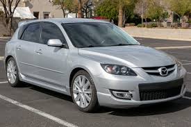 Image result for Sunlight Silver 2007 Mazda3