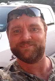 PICTURED: Murderer's son is arrested for lashing out during his execution