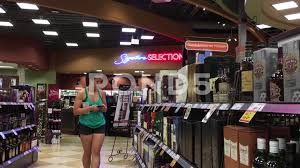People Choosing Wine Inside Bc Liquor Store Stock Footage Wine Bc People Choosing Liquor Store Liquor Stock Video