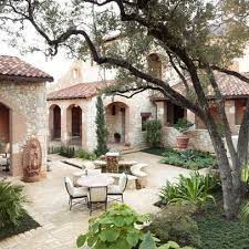 Courtyard entries can often be found in mediterranean and mission style designs. 14 Courtyard Style Homes Ideas Courtyard Courtyard House House Design