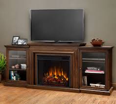 Wood storage space inside and outside is a factor to be considered. Real Flame 72 Frederick Electric Fireplace Media Cabinet Pottery Barn