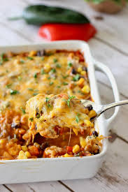 Casseroles are an awesome way to sneak them in — just add in your faves (be sure to saute first to release their liquid). Healthy Mexican Casserole Laughing Spatula