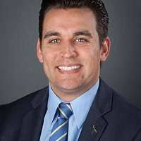 RADM Christopher J. Murray, Commander, Naval Safety Center, delivers a  speech during the