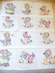 I have made a baby quilt out of 12 squares (8x8) of little girls in bonnets, and i don't know whether to quilt across the whole quilt, including the embroidery, or do some kind of free motion quilting in the columns and rows between the squares. Vintage Quilt Blocks 12 Hand Embroidered Nursery Quilt Blocks Cats Baby Quilt Patchwork Quilt Vintage Linens Embroidered Quilts Vintage Quilts Quilt Patterns