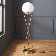 Shop Solis Globe Floor Lamp White Globe Shade Hovers Atop A Minimalist Brass Base That Rises In Hourglass For Globe Floor Lamp Floor Lamp Modern Floor Lamps