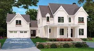 House plans with a mother in law suite typically begin with a standard multi bedroom house plan for the main residence which can appear in virtually any style. House Plans With Inlaw Suites Frank Betz Associates