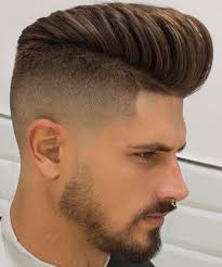 The fade haircut has generally been catered to men with short hair, but lately, guys have been combining a low or high fade with medium or long hair on top. Fade Haircuts For Handsome Men In The 21 St Century