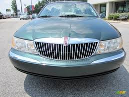 Image result for Charcoal Green 1999 Town Car