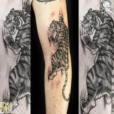 Jungkook S Tiger Tattoo In 2021 Jungkook Tattoo Tiger Tattoo Jungkook Tattoo Ideas