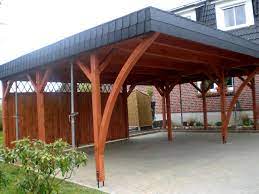 Wir zeigen beispiele gängiger materialien als inspiration für ihre richtige dacheindeckung. Carport In Hamburg Mit Schwarzen Schindeln Schindeln Dachziegel Fassadenplatten Aus Kunststoff