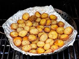 These Extra Crispy Potatoes Are Easy To Cook On The Grill In Foil And Are Tossed In My Grandmother S Rosemary Sea In 2020 Grilled Potatoes Cooking On The Grill Cooking