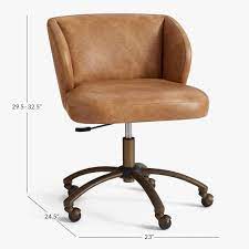 Handsome patent leather oversized rolling executive desk chair. Vegan Leather Caramel Wingback Swivel Desk Chair Pottery Barn Teen
