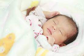 Sleeping Newborn Baby (Japanese Baby Girl) Stock Photo, Picture And Royalty  Free Image. Image 33531383.