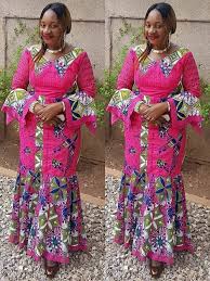 Femme nue, femme noire vétue de ta couleur qui est vie, de ta forme qui est beauté j'ai grandi à ton ombre; African Fashion African Wedding Nigerian Fashion Ankara Kitenge Aso O African Print Fashion Dresses African Fashion Dresses Latest African Fashion Dresses