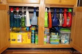 tension rod in under sink cabinet to
