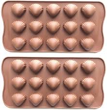 Silikomart has introduced silicone chocolate molds to make light work of your chocolate truffle making endeavors. Amazon Com 2pcs Silicone Shells Chocolate Molds For Birthday Summer Theme Party Anniversary Wedding Shell Shaped Mold For Baking Candy Cookies Kitchen Dining