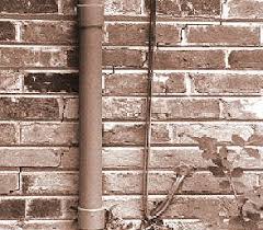 The flaking paint and damaged baseboard are signs of a hidden water leak. Common Problems With Brick Masonry U S National Park Service