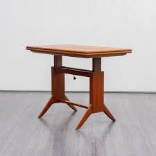 Extendable dining room tables are made from different materials. Height Adjustable Extendable Teak Coffee Dining Table By Wilhelm Renz 1950s 92094