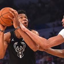 The lakers' anthony davis dunks in front of milwaukee's giannis antetokounmpo during a game last month in milwaukee. Game 32 Anthony Davis And Short Handed Pelicans Can Silence Critics At Least For One Night Against Giannis Antetokounmpo And The Bucks The Bird Writes