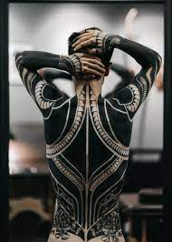 The tattoo is said to express the individuality, the emotions and the kind of road the person traveled. Person Wearing Full Body Tattoo Art Photo Free Kyiv City Image On Unsplash